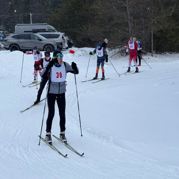 Feature image for RESULTS: Mandy Paull and Ryan Harris win 2025 Winter Wolf Skiathlon